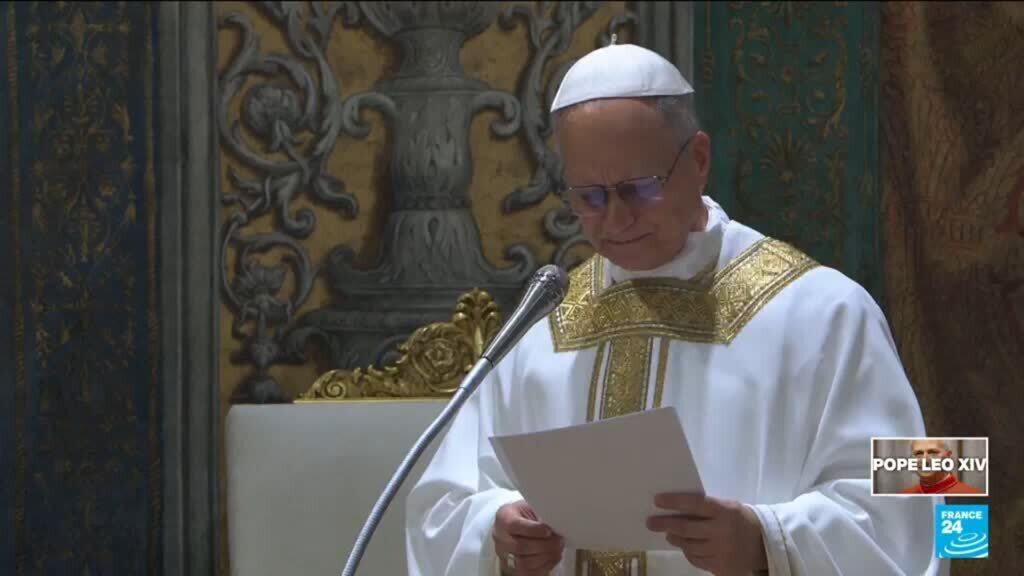 Chicago-born Pope Leo XIV offers a few words in English at his first Mass